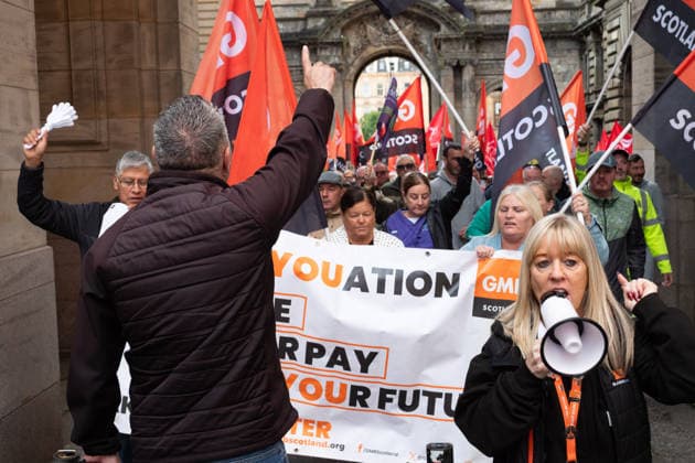August 20, 2026, Glasgow, Scotland, UK: Members of the Unite, UNISON and GMB unions held a protest outside Glasgow City Chambers to coincide with a vote on a new pay and grading scheme for council employees. The unions claim the councils proposals would adversely affect low-paid workers, particularly women, who they say have been underpaid for two decades. Glasgow UK  - ZUMAs357 20260820_zip_s357_015 Copyright: xCameronxScottx