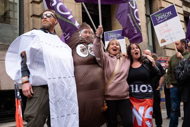 August 20, 2026, Glasgow, Scotland, UK: Members of the Unite, UNISON and GMB unions held a protest outside Glasgow City Chambers to coincide with a vote on a new pay and grading scheme for council employees. The unions claim the councils proposals would adversely affect low-paid workers, particularly women, who they say have been underpaid for two decades. Glasgow UK - ZUMAs357 20260820_zip_s357_017 Copyright: xCameronxScottx