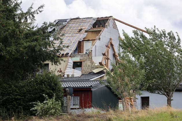 A house is destroyed, after yesterday s passage of a mini-tornado in Bullingen, pictured taken on Thursday 20 August 2026. The Belgian Eifel region got hit by whirlwind and severe thunderstorms on Wednesday evening.  JULIENxWARNAND 183826019