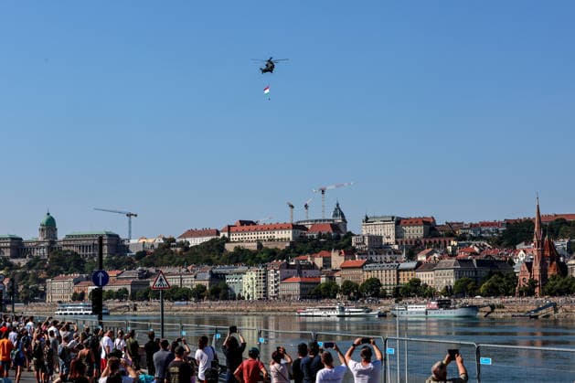 (260820) -- BUDAPEST, Aug. 20, 2026 -- A Hungarian Air Force helicopter participates in a military air parade over the Danube in Budapest, Hungary, on Aug. 20, 2026. Hungary marks its national day on Thursday with traditional ceremonies, music concerts, and a redesigned evening spectacle in Budapest. (Photo by Xinhua) HUNGARY-BUDAPEST-NATIONAL DAY-CELEBRATION DavidxBalogh 