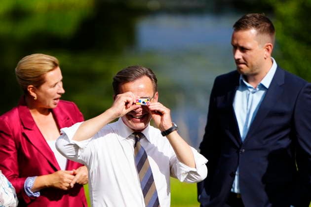 Denmark Nordic Summer Meeting Swedens Prime Minister Ulf Kristersson snaps a photo with a mini camera between Denmarks Prime Minister Mette Frederiksen and Chairman of the Government of Greenland Jens-Frederik Nielsen in the garden of Marienborg as The Prime Minister of Denmark and the Faroese Prime Minister are hosting the Nordic heads of government at Hoevelte Barracks and Marienborg on Thursday, August 20, 2026. The summer meeting begins with a visit to Hoevelte Barracks, where the leaders are shown modern military capabilities. The meeting then continues at Marienborg, where they will discuss, among other things, closer Nordic defense cooperation, the Nordic regions role in the geopolitical situation, and the protection of children and  Copyright: MadsxClausxRasmussenx spdk20260820-162152-L