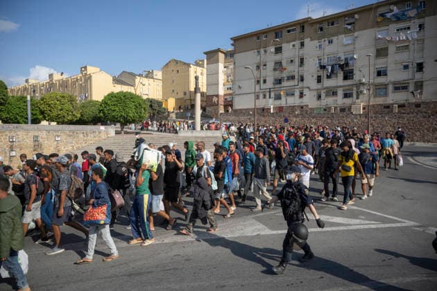 Police Clear Trampolín Beach in Ceuta Migrants cleared from Trampolín Beach are on their way to be relocated, August 20, 2026, in Ceuta, Spain. Police have begun to clear the makeshift migrant camp on Trampolín Beach in Ceuta. The autonomous city continues to face a serious humanitarian crisis following the historic mass influx of more than 70,000 migrants who swam across the Tarajal Strait on 30th and 31st of last July 20 AUGUST 2026 Ceuta Ceuta, Spain  Copyright: xMarcosxMorenox 7722743