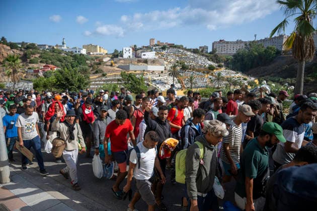 Police Clear Trampolín Beach in Ceuta Migrants cleared from Trampolín Beach are on their way to be relocated, August 20, 2026, in Ceuta, Spain. Police have begun to clear the makeshift migrant camp on Trampolín Beach in Ceuta. The autonomous city continues to face a serious humanitarian crisis following the historic mass influx of more than 70,000 migrants who swam across the Tarajal Strait on 30th and 31st of last July 20 AUGUST 2026 Ceuta Ceuta, Spain  Copyright: xMarcosxMorenox 7722747