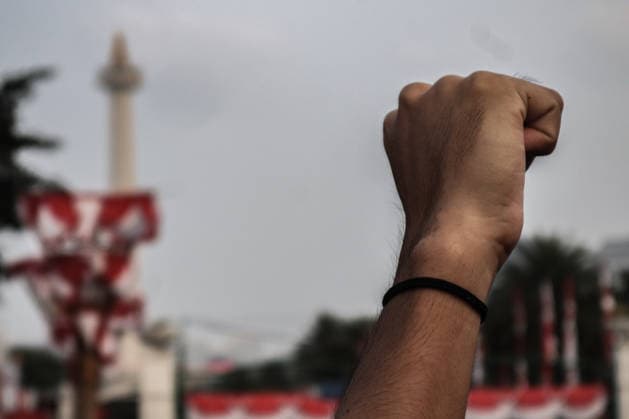 August 20, 2026, Jakarta, Dki Jakarta, Indonesia: JHuman rights activists take part in the 921st Kamisan protest across from the Merdeka Palace in Jakarta. The weekly Thursday demonstration was held to mark World Humanitarian Day. Jakarta Indonesia  - ZUMAf198 20260820_zip_f198_005 Copyright: xMuhammadxFebriansyahx