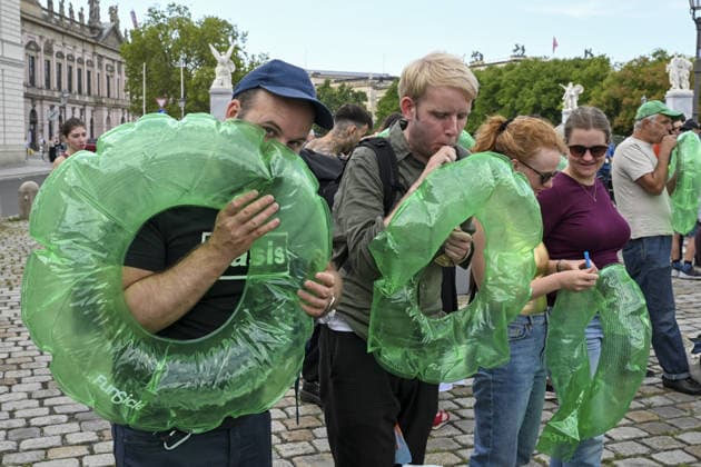 Protesters gather in Berlin calling for end to century-old swimming ban in Spree River BERLIN, GERMANY - AUGUST 20: Demonstrators gather at Schinkelplatz near the Spree River in Berlin, Germany, on August 20, 2026, to demand the lifting of a 101-year-old swimming ban in the historic waterway. Responding to a call by the Flussbad Berlin association, participants displayed banners and placards advocating for clean water initiatives and public access to open-water swimming along designated central stretches of the river. Halil Sagirkaya Anadolu Berlin Germany. Editorial use only. Please get in touch for any other usage.  Copyright: x2026xAnadoluxHalilxSagirkayax