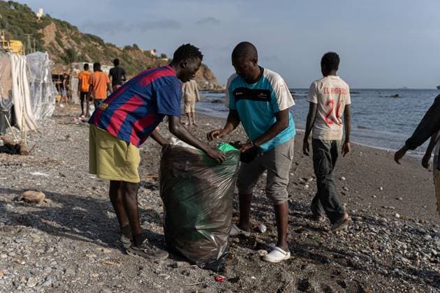 Migrants live in makeshift settlement on Ceuta beach CEUTA, SPAIN, AUGUST 20, 2026: Hundreds of migrants live in a makeshift settlement at Trampolin Beach in Ceuta, using shelters built from reeds, plastic and other discarded materials. Ceuta Spain Copyright: x xClaudioxPalmax xJNAxPressx