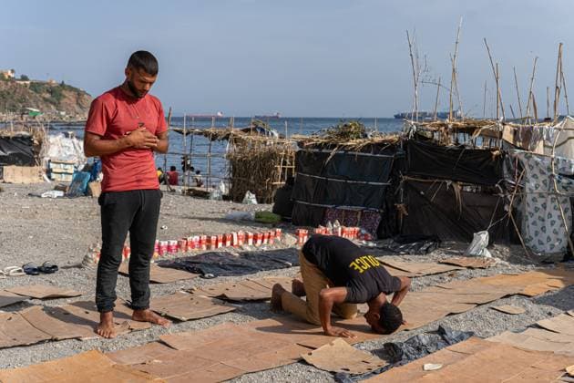 Migrants live in makeshift settlement on Ceuta beach CEUTA, SPAIN, AUGUST 20, 2026: Hundreds of migrants live in a makeshift settlement at Trampolin Beach in Ceuta, using shelters built from reeds, plastic and other discarded materials. Ceuta Spain Copyright: x xClaudioxPalmax xJNAxPressx
