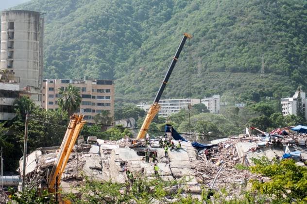 Earthquake damage remains along Venezuela™s coast LA GUAIRA, VENEZUELA, AUGUST 20, 2026: Collapsed residential and hotel structures remain along the coastline of La Guaira nearly two months after an earthquake struck Venezuela s central coast. The damaged buildings stand near marinas and the Caribbean Sea as assessments continue on the condition and stability of affected areas. La Guaira Venezuela (Bolivarian Republic of) Copyright: x xMarioxFloresx xJNAxPressx