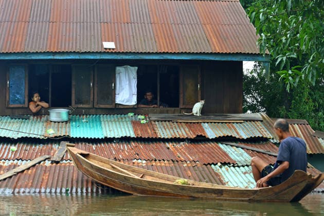 August 20, 2026, Ngathaingchaung, Ayeyarwady Region, Myanmar: People resident remains inside a flooded house in Ngathaingchaung Township, Ayeyarwady Region, Myanmar..In Laymyethna Township, Ayeyarwady Region, the Ngawun River embankment collapsed on July 31, leaving nearby towns including Hinthada, Yegyi, Ngathaingchaung, Kyonpyaw and Kyaunggon still inundated for three weeks, affecting tens of thousands of people, officials said. Ngathaingchaung Myanmar - ZUMAn324 20260820_zip_n324_012 Copyright: xAyexMyaxNaingx