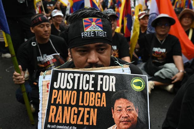 KOLKATA, INDIA - AUGUST 20: Members of the Tibetan community and local human rights activists shout anti-China slogans in protest to oppose Beijing s restrictive Promoting Ethnic Unity and Progress Law outside the Chinese Consulate General on August 20, 2026 in Kolkata, India. Protesters also observed the 49th-day traditional Buddhist mourning rites for activist Lobsang Palden (Lobga Rangzen), who committed self-immolation outside the United Nations headquarters in New York to draw global attention to conditions in Tibet. (Photo by Samir Jana Hindustan Times) Tibetan Activists Protesting Outside The Chinese Consulate In Kolkata Against Ethnic Unity Law