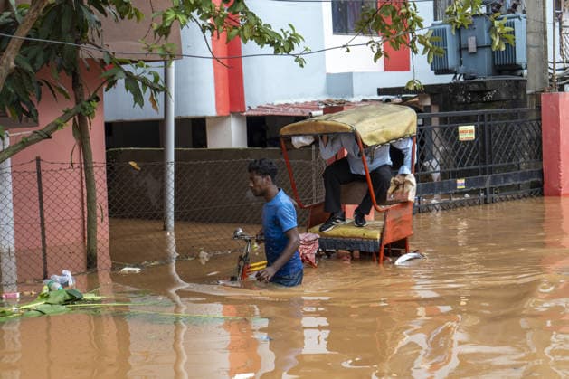 Heavy monsoon rains cause floodings in Assam GUWAHATI, ASSAM, INDIA - AUGUST 21: Residents commute in a cycle rickshaw through a flooded street after heavy monsoon rains in Guwahati, India on August 21, 2026. David Talukdar Anadolu Guwahati India. Editorial use only. Please get in touch for any other usage.  Copyright: x2026xAnadoluxDavidxTalukdarx