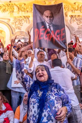 Protesters March Against Tunisian President Kais Saied - Tunis Protesters march through central Tunis, Tunisia on August 20, 2026, against President Kais Saied, demanding his resignation and greater political freedoms while calling for the release of detainees and opponents, as seen with portraits of Saied crossed out with the slogan DEGAGE and Tunisian flags, amid growing social unrest following weeks of extreme heat, water and electricity cuts, and shortages of essential medicines and products. Photo by Nicolas Fauque Images de Tunisie ABACAPRESS.COM Tunis Tunisia  Copyright: xFauquexNicolas ImagesxdexTunisie ABACAx