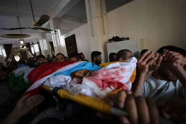 August 21, 2026, Hebron, Palestine, State of: SAÃ¢â‚¬â ¢IR, HEBRON, WEST BANK, AUGUST 21, 2026: Palestinians attend the funeral of 17-year-old Karim Sand Shalaldeh in the village of SaÃ¢â‚¬â ¢ir, east of Hebron, after he was killed during a settler attack on the village earlier in the day. Several Palestinians were also injured and a house was set on fire during the attack. Hebron Palestine, State of - ZUMAq101 20260821_zna_q101_092 Copyright: xMosabxShawerx