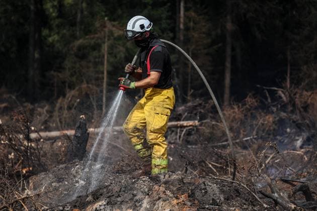 A guided visit is organized to the firefighters still active on the site of the fires in the Hautes Fagnes (High Fens) nature reserve, on Friday 21 August 2026. The fire started on August 14th and 3000 hectares (on a total of 4500) are impacted.  JULIENxWARNAND 183919085