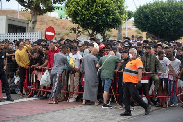 The humanitarian crisis in Ceuta continues. Migrants protest to be relocated on the streets of Ceuta, August 21, 2026, in Ceuta, Spain. Ceuta continues to face a serious humanitarian crisis following the historic mass influx of more than 70,000 migrants who swam across the Tarajal on July 30 and 31. Although the police deployment and border reinforcement by Moroccan authorities have succeeded in curbing the influx, the autonomous city continues to face a serious humanitarian, health, and security crisis. AUGUST 21, 2026, Spain  Copyright: xMarcosxMorenox 7724497