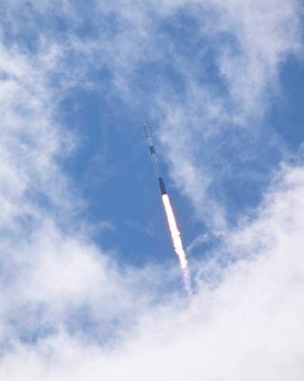 As viewed from the Complex 39 viewing site, SpaceX launches the Falcon 9 rocket carrying an additional 29 Starlink satellites on mission 10-39 at at 11:14 AM from Launch Complex 40 at the Cape Canaveral Space Force Station, Florida on Friday August 21, 2026.  CCP20260821006 JOExMARINO