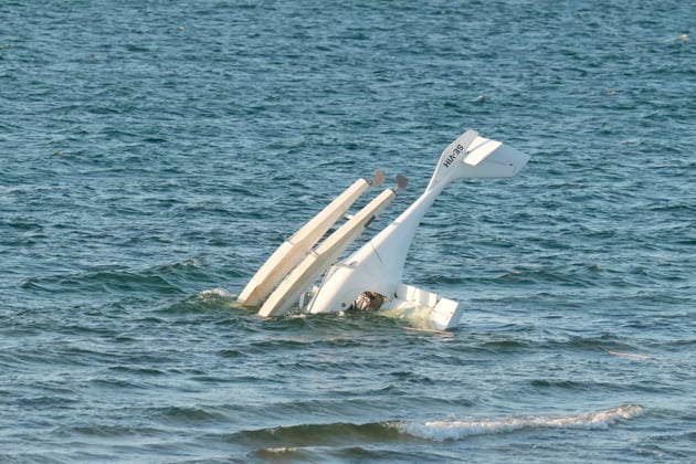 Plane is upside down - two people on board Small plane is seen 20 meters out in the water at the beach near Storedal off the Island of Laesoe, Denmark, Friday August 21, 2026. North Jutland Emergency Services tells that a Swedish man and a Norwegian man were on board, and both are unharmed and currently staying at a hotel. , Laesoe Denmark *** The plane is upside down with two people on board. The small plane is visible 20 meters out in the water at the beach near Storedal off the island of Laesoe, Denmark, on Friday, August 21, 2026. North Jutland Emergency Services reports that a Swedish man and a Norwegian man were on board; both are unharmed and are currently staying at a hotel in Laesoe, Denmark.  Copyright: ClausxFiskerx spdk20260821-195205-L