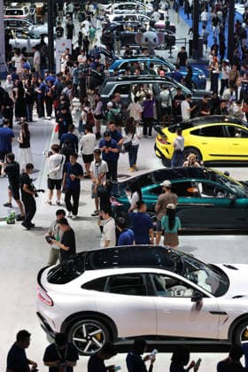 CHENGDU, CHINA - AUGUST 21: Visitors gather at a booth displaying domestic new energy vehicles during the opening of the 29th Chengdu International Automobile Exhibition on August 21, 2026 in Chengdu, Sichuan Province of China. The event features approximately 120 mainstream automotive brands from China and abroad showcasing around 1,600 vehicles under the theme Riding the Tide and Moving Towards the New.  Copyright: xChinaxNewsxServicex 111661276758