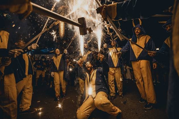 August 21, 2026, Barcelona, Catalonia, Spain: Fire runners gather to ignite their firework staffs beneath a shower of sparks during the traditional Ã¢â‚¬ËœCorrefocÃ¢â‚¬â ¢ at the Festa Major de Gracia Barcelona Spain - ZUMAo105 20260821_fap_o105_001 Copyright: xMatthiasxOesterlex