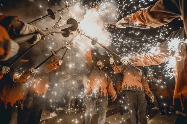 August 21, 2026, Barcelona, Catalonia, Spain: Fire runners gather to ignite their firework staffs beneath a shower of sparks during the traditional Ã¢â‚¬ËœCorrefocÃ¢â‚¬â ¢ at the Festa Major de Gracia Barcelona Spain - ZUMAo105 20260821_fap_o105_012 Copyright: xMatthiasxOesterlex