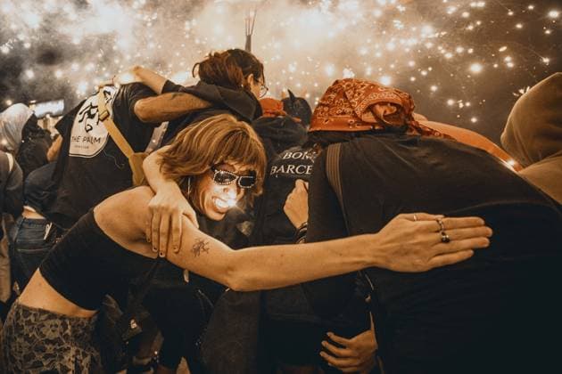 August 21, 2026, Barcelona, Catalonia, Spain: Participants dance beneath showers of sparks during the traditional Ã¢â‚¬ËœCorrefocÃ¢â‚¬â ¢ at the Festa Major de Gracia Barcelona Spain - ZUMAo105 20260821_fap_o105_019 Copyright: xMatthiasxOesterlex