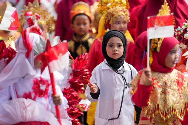August 22, 2026, Banda Aceh, Aceh, Indonesia: Kindergarten children, accompanied by their teachers and parents, were seen participating in an Independence Day parade in Banda Aceh, Aceh Province, Indonesia, on Saturday. Dressed in traditional costumes from various regions and outfits representing diverse professions, the thousands of participants paraded through the city to celebrate Indonesia s independence, with the aim of fostering a sense of nationalism and togetherness from an early age. Banda Aceh Indonesia  - ZUMAi115 20260822_zip_i115_008 Copyright: xMuhammadxIqbalx