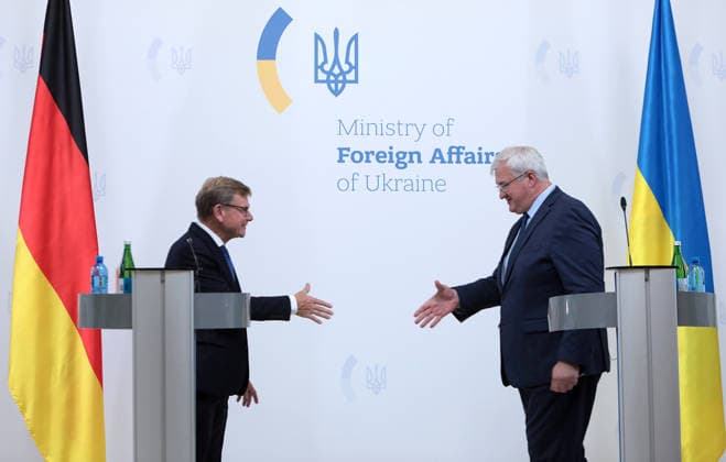 Joint news conference of Ukrainian and German Foreign Ministers in Kyiv Foreign Minister of Ukraine Andrii Sybiha (R) shakes hands with Federal Minister for Foreign Affairs of Germany Johann Wadephul at the end of their joint news conference following negotiations, Kyiv, Ukraine, August 22, 2026. The talks focused on strengthening defence support for Ukraine, protecting critical infrastructure, preparing for winter, and diplomatic steps to end the war. The German Foreign Minister™s visit took place on the eve of the 35th anniversary of Ukraine™s independence, amid another wave of massive Russian attacks on civilian targets., Credit:Hennadii Minchenko Ukrinform Avalon Ukraine, Kyiv  Copyright: xHennadiixMinchenkox xUkrinformx xAvalonx 1127332765