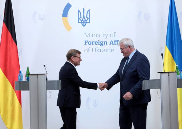Joint news conference of Ukrainian and German Foreign Ministers in Kyiv Foreign Minister of Ukraine Andrii Sybiha (R) shakes hands with Federal Minister for Foreign Affairs of Germany Johann Wadephul at the end of their joint news conference following negotiations, Kyiv, Ukraine, August 22, 2026. The talks focused on strengthening defence support for Ukraine, protecting critical infrastructure, preparing for winter, and diplomatic steps to end the war. The German Foreign Minister™s visit took place on the eve of the 35th anniversary of Ukraine™s independence, amid another wave of massive Russian attacks on civilian targets., Credit:Hennadii Minchenko Ukrinform Avalon Ukraine, Kyiv  Copyright: xHennadiixMinchenkox xUkrinformx xAvalonx 1127332872