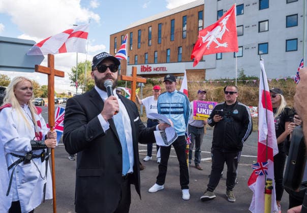 August 22, 2026, Gloucester, Gloucestershire, UK: Gloucester, UK. NICK TENCONI, leader of UKIP, speaks. A protest by a group called Gloucester Patriots at the Ibis Hotel in Bristol where asylum seekers and migrants are being accommodated. An anti-racist counter protest in support of refugees took place at the same location. Gloucester UK  - ZUMAl94_ 20260822_zaf_l94_012 Copyright: xSimonxChapmanx