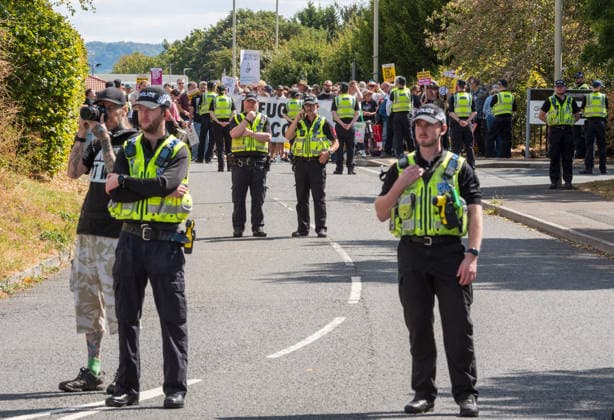 August 22, 2026, Gloucester, Gloucestershire, UK: Gloucester, UK. Police watch over a protest by a group called Gloucester Patriots at the Ibis Hotel in Bristol where asylum seekers and migrants are being accommodated. An anti-racist counter protest in support of refugees took place at the same location. Gloucester UK  - ZUMAl94_ 20260822_zaf_l94_013 Copyright: xSimonxChapmanx
