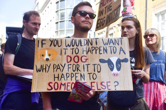 August 22, 2026, London, England, United Kingdom: Protesters pass through Mayfair during the National Animal Rights March. Animal rights activists, protesters, and members of various organisations marched through Central London in support of animal rights, in protest against all forms of animal exploitation, and urged people to go vegan. London United Kingdom  - ZUMAv130 20260822_zip_v130_020 Copyright: xVukxValcicx