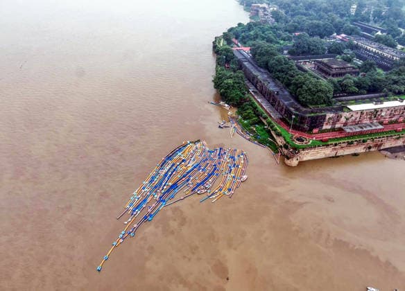 RECORD DATE NOT STATED An aerial view of a floating jetty inundated by the swollen waters of the Ganga and Yamuna rivers near the Sangam Prayagraj, Aug 22 (ANI): An aerial view of a floating jetty inundated by the swollen waters of the Ganga and Yamuna rivers near the Sangam, in Prayagraj on Saturday. Prayagraj Uttar Pradesh India Copyright: xANIx ANI_20260822211
