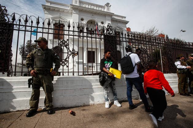 Santiago, August 22, 2026: The Haitian Embassy in Santiago is stormed by Haitian citizens due to issues with embassy staff and excessive fees for the paperwork required to work in Chile. Diego Martin Aton, Chile; Aton 1182703.jpeg  Copyright: DIEGOxMARTIN ATONxCHILE