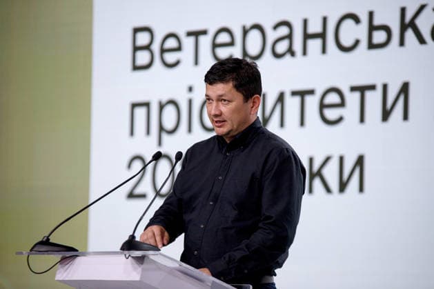 Minister for Veterans Affairs of Ukraine Vitalii Kim delivers a speech during the Ninth International Veterans Forum, Kyiv, Ukraine, August 22, 2026. Hundreds of veterans, representatives of the Ukrainian government, foreign partners, and distinguished guests took part in the large-scale annual event, which serves as Ukraine’s principal platform for dialogue on the development and implementation of state veterans’ policy. (Photo by Marianna Kotyk Ukrinform) Ninth International Veterans Forum in Kyiv  Copyright: xMariannaxKotykx