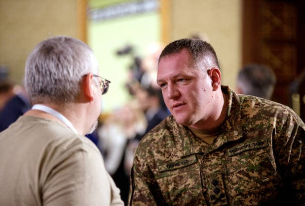 Commander of the National Guard of Ukraine, Major General Oleksandr Pivnenko (R) attends the Ninth International Veterans Forum, Kyiv, Ukraine, August 22, 2026. Hundreds of veterans, representatives of the Ukrainian government, foreign partners, and distinguished guests took part in the large-scale annual event, which serves as Ukraine’s principal platform for dialogue on the development and implementation of state veterans’ policy. (Photo by Marianna Kotyk Ukrinform) Ninth International Veterans Forum in Kyiv  Copyright: xMariannaxKotykx