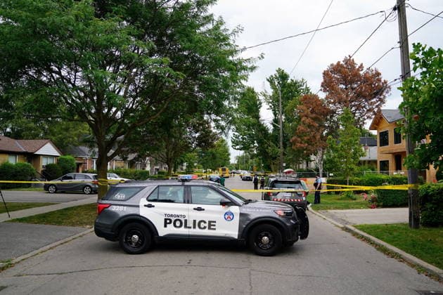 August 22, 2026, Toronto, On, CANADA: Police are shown at a closed-off residential street following an officer-involved shooting incident, in Toronto, Saturday, Aug. 22, 2026. Toronto CANADA  - ZUMAc35_ 20260822_zaf_c35_044 Copyright: xKeitoxNewmanx
