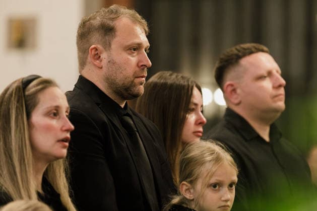 Belarusian opposition leader Aliaksandr Milinkevich Funeral in Warsaw - 22 Aug 2026 Igor Kuley, the son of Belarusian politician Aliaksandr Milinkevich, stands during Mass at St. John the Baptist Archcathedral in Warsaw s Old Town. Aliaksandr Milinkevich was a Belarusian politician and public figure. He was the united democratic opposition candidate in the 2006 presidential election and received the European Parliament’s Sakharov Prize. He died in exile in Poland on 11 August 2026, aged 79, after a long illness and complications following surgery. He will be buried at Pow?zki Cemetery in Warsaw, as he cannot be buried in Belarus. Warsaw Poland Copyright: xVolhaxShukailax xSOPAxImagesx VSHUKAILA_6942