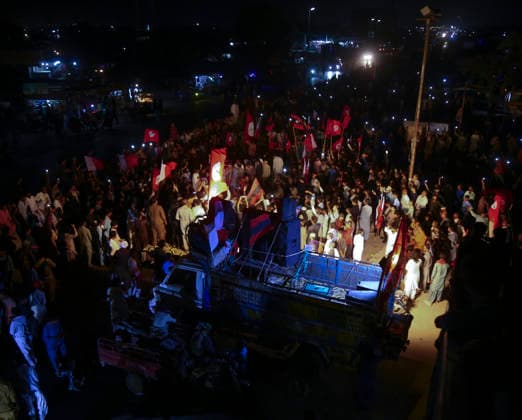 Sindh Action Committee March Hyderabad Pakistan Nationalist party workers gather around a truck equipped with loudspeakers at night during a demonstration to protest the creation of new administrative units in Hyderabad, Pakistan, on August 22, 2026. The Sindh Action Committee organized the demonstration to demand that the province remain undivided. Hyderabad Sindh Pakistan Copyright: xJanxAlixLagharix