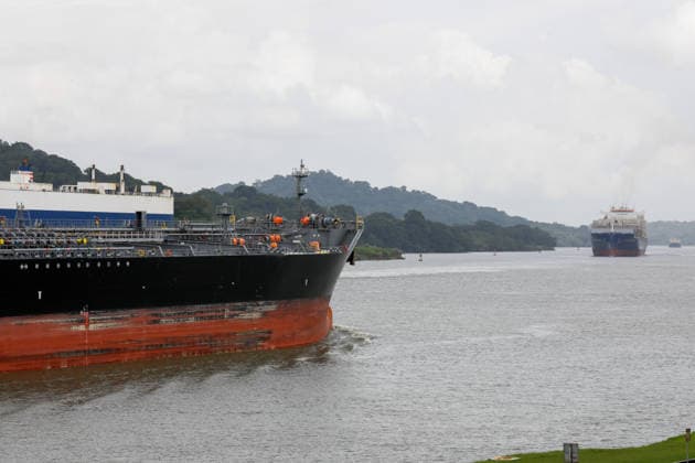 Panama Canal cuts daily transit slots amid reduced rainfall PANAMA CITY, PANAMA - AUGUST 22: A cargo vessel transits through the Panama Canal in Panama City, Panama, on August 22, 2026. The Panama Canal Authority announced temporary reductions in daily transit capacity at both the Neopanamax and Panamax locks due to below-expected rainfall in the canal watershed. Effective September 3, the number of daily slots at the Neopanamax Locks will be reduced to nine, while Panamax Locks will have 25 daily slots, falling to 23 from September 15. The authority said the measures aim to preserve service reliability and safeguard water resources for human consumption amid reduced precipitation despite the arrival of the rainy season and water-saving mea  Copyright: x2026xAnadoluxDanielxGonzalezx