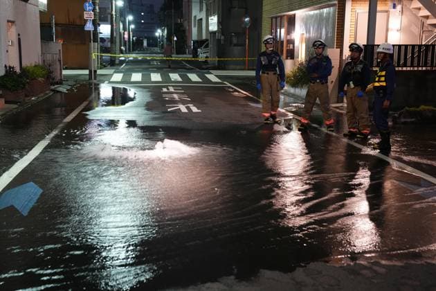 Strong earthquake hits Tokyo area A street is partially flooded in Tokyo in the early hours of Aug. 23, 2026, following the rupture of a water pipe triggered by a strong earthquake that struck eastern Japan.  A14AA0005626415P