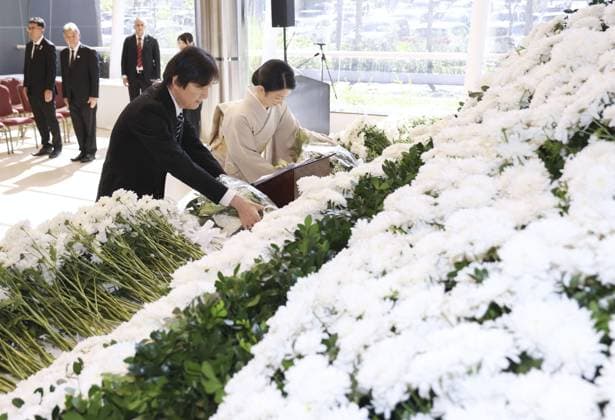 Japan crown prince, crown princess in Paraguay Japan s Crown Prince Fumihito and Crown Princess Kiko lay flowers during a ceremony marking 90 years of Japanese immigration to Paraguay on Aug. 21, 2026, near Asuncion. (Pool photo)  A14AA0005626455P