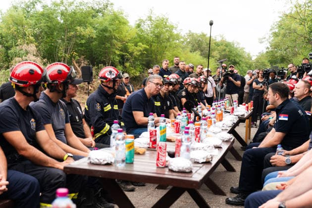 August 23, 2026, Umarak, Vojvodina, Serbia: 2026823, A umarak, Serbia -Serbian President VUCIC ALEKSANDAR visits the Deliblato Sands (Deliblatska Pescara) Special Nature Reserve to inspect the areas devastated by a massive wildfire. The president held an outdoor briefing and shared a meal with firefighters, military personnel, and rescue teams to discuss the ongoing response to the natural disaster. Umarak Serbia - ZUMAd223 20260823_zip_d223_007 Copyright: xMarkoxDimicx