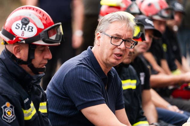August 23, 2026, Umarak, Vojvodina, Serbia: 2026823, A umarak, Serbia -Serbian President VUCIC ALEKSANDAR visits the Deliblato Sands (Deliblatska Pescara) Special Nature Reserve to inspect the areas devastated by a massive wildfire. The president held an outdoor briefing and shared a meal with firefighters, military personnel, and rescue teams to discuss the ongoing response to the natural disaster. Umarak Serbia - ZUMAd223 20260823_zip_d223_014 Copyright: xMarkoxDimicx