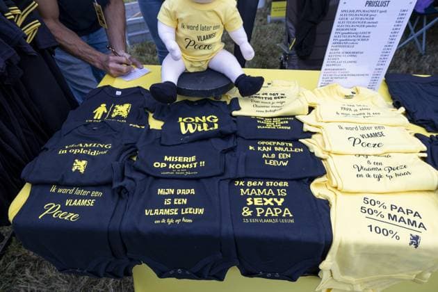 Merchandising pictured during the IJzerwake at the IJzertreffen radical Flemish far-right gathering at the Gebroeders Van Raemdonck Monument in Zuidschote, Ieper (Ypres), Sunday 23 August 2026. The Ijzerwake commemorates the victims of the two World Wars combined with a rally for Flemish independence. The event derives its name from the IJzer (Yser) river where the most deadly battles of WWI were fought.  NICOLASxMAETERLINCK 184068171