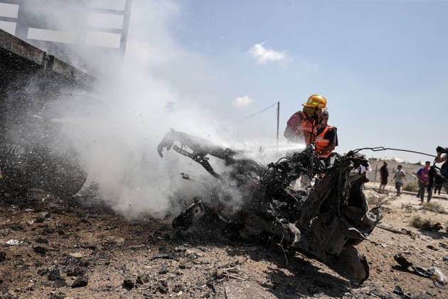 Israeli attacks on Gaza continue despite ceasefire GAZA STRIP, GAZA, PALESTINE - AUGUST 23: Firefighters intervene to extinguish several vehicles that caught fire following an Israeli airstrike that destroyed several homes and tents where displaced Palestinians were staying in Zuvayda, Gaza Strip, Palestine, on August 23, 2026. Ali Jadallah Anadolu Gaza Strip Gaza. Editorial use only. Please get in touch for any other usage.  Copyright: x2026xAnadoluxAlixJadallahx