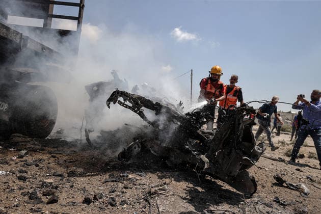 Israeli attacks on Gaza continue despite ceasefire GAZA STRIP, GAZA, PALESTINE - AUGUST 23: Firefighters intervene to extinguish several vehicles that caught fire following an Israeli airstrike that destroyed several homes and tents where displaced Palestinians were staying in Zuvayda, Gaza Strip, Palestine, on August 23, 2026. Ali Jadallah Anadolu Gaza Strip Gaza. Editorial use only. Please get in touch for any other usage.  Copyright: x2026xAnadoluxAlixJadallahx