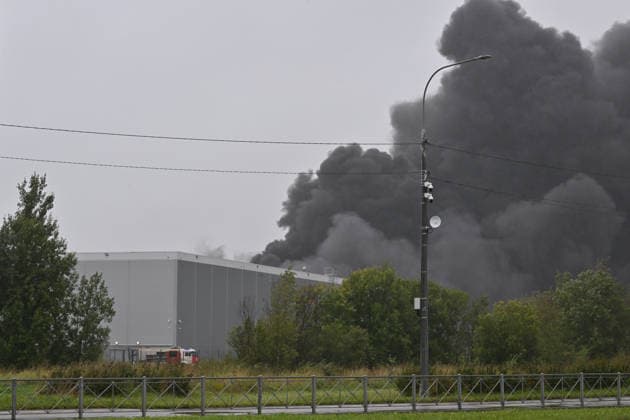Fire breaks out at logistics center in St. Petersburg ST. PETERSBURG, RUSSIA - AUGUST 23: Thick black smoke rises after a fire breaks out at a logistics center in St. Petersburg, Russia, on August 23, 2026. Boris Smirnov Anadolu Saint Petersburg Russia. Editorial use only. Please get in touch for any other usage.  Copyright: x2026xAnadoluxBorisxSmirnovx