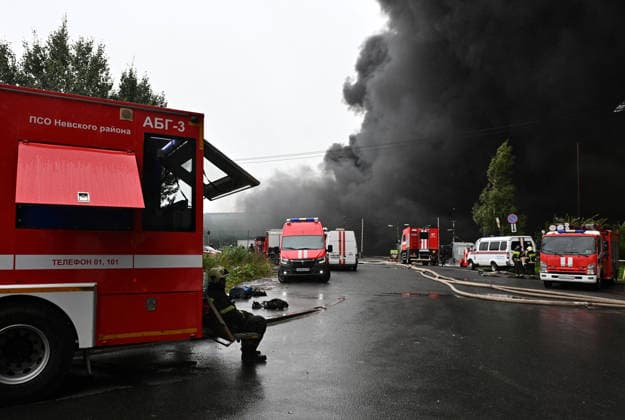 Fire breaks out at logistics center in St. Petersburg ST. PETERSBURG, RUSSIA - AUGUST 23: Firefighters respond to the area where a fire broke out at a logistics center as thick black smoke rises in St. Petersburg, Russia, on August 23, 2026. Boris Smirnov Anadolu Saint Petersburg Russia. Editorial use only. Please get in touch for any other usage.  Copyright: x2026xAnadoluxBorisxSmirnovx
