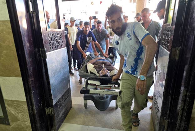 Wounded Palestinians Arrive at Nasser Medical Complex After Israeli Strike Palestinians transport seven wounded people, including children, to Nasser Medical Complex in Khan Younis, in the southern Gaza Strip, on August 23, 2026, following an Israeli strike that targeted civilians in Khan Younis refugee camp. Photo by Tariq Mohammad APA Images Khan Yunis Gaza Strip Palestinian Territory 230826_Khan_Yunis_TM_03(15) Copyright: xapaimagesxTariqxMohammad xapaimagesx