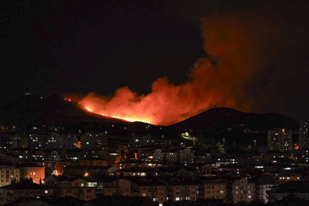 Firefighters respond to fire in wooded area in Ankara ANKARA, TURKIYE - AUGUST 23: Smoke rises from a wooded area in the Mamak district of Ankara, Turkiye on August 23, 2026, as firefighters work to extinguish the wide-scale fire using two fire trucks and three water tankers. Metin Aktas Anadolu Ankara Turkey. Editorial use only. Please get in touch for any other usage.  Copyright: x2026xAnadoluxMetinxAktasx